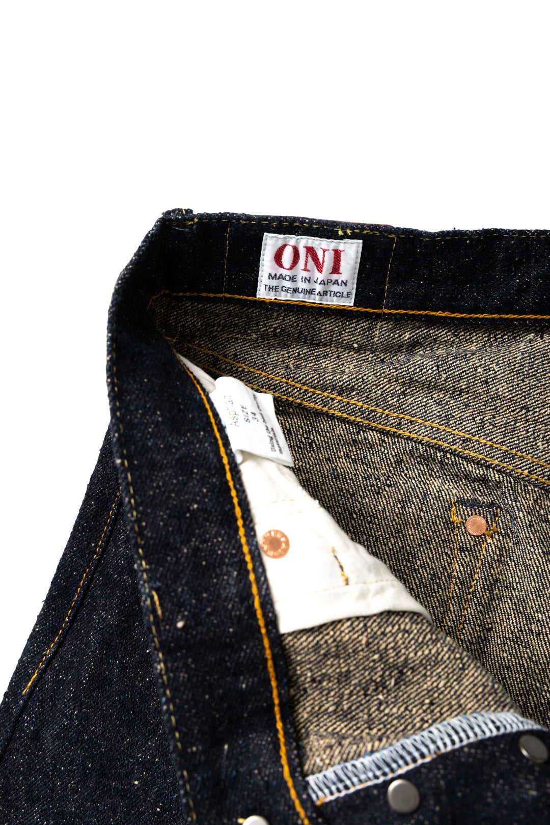 Oni Denim, legends of denim, new heavyweight selvedge- the Asphalt. Extreme slubbiness and neppy construction, weighing in at 20oz in a Relax Tapered fit. A dark indigo denim that is rugged and woven with low tension, using specially twisted thick yarns. Oni Original Japanese Selvedge denim featuring a cow leather patch. One Wash. Special edition for Blue in Green featuring plain rear pockets. Made in Japan. Model is 6'3 wearing a size 34. Unisex. 100% Cotton. 